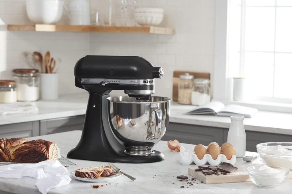 "Unleash Your Culinary Creativity with the Powerful KitchenAid Artisan Series 5 Quart Tilt-Head Stand Mixer"